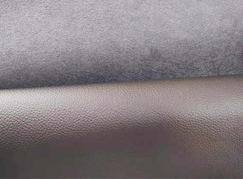 How does the chemical structure of PVC leather contribute to its resistance against wear, tear, and fading?